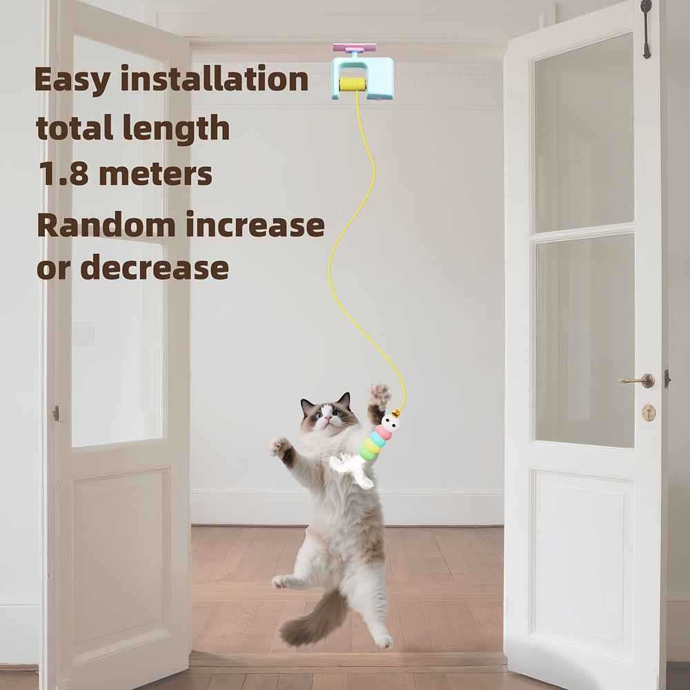 Automatic swinging cat toy hung over a door