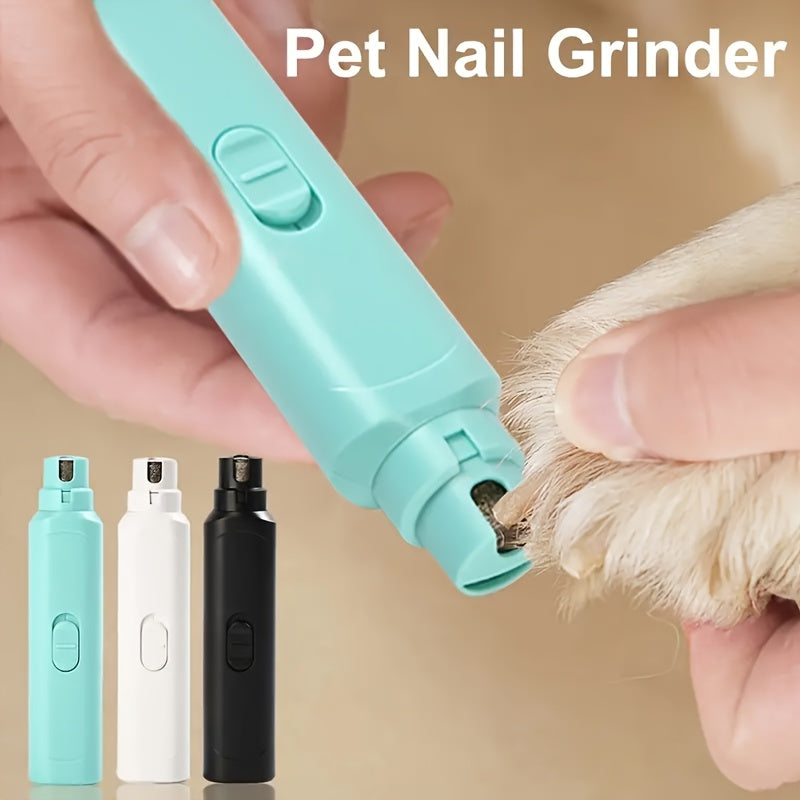 Hand holding the nail grinder against a dog's paw