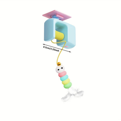 Cat reaching for the swinging toy