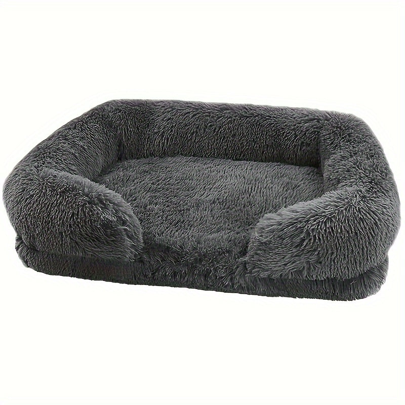 Long plush pet sofa bed with a dog lying on it